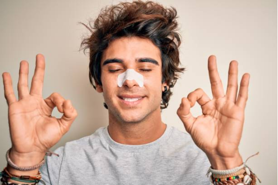 Athletes using nasal strips for enhanced breathing and recovery