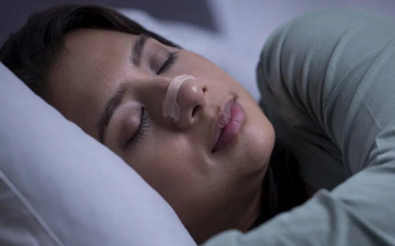 close-up of nasal strips improving airflow during short nighttime rest