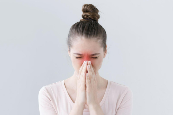 Person using nasal strips during sleep to improve airflow.